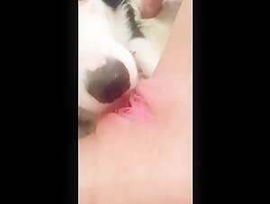 Teen relieves herself on dog's face while he licks her pussy