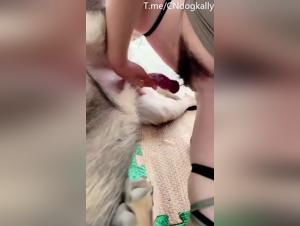 Barnyard Bestiality: She devours him, legs in the air, with her dog