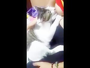 Woman caring for a wild cat