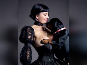 Busty Goth dominated by a canine drive