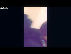 Teenage girl has fun with black dog in beastly video