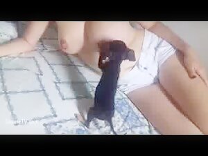 Woman Breastfeeding an Animal